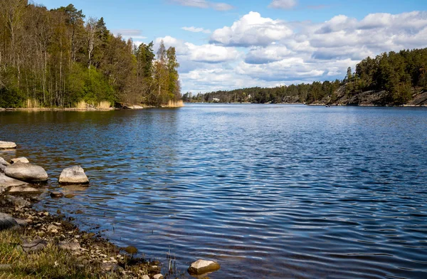 Sweden. Lake under a blue spring sky