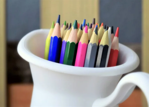 Colored crayons for painting and painting