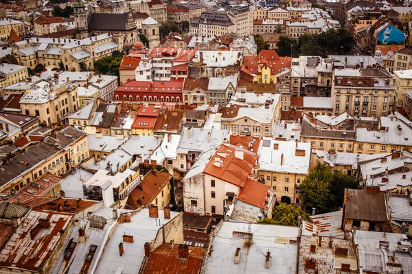 Top view on colorful roofs and houses of old European city — Stock Photo, Image