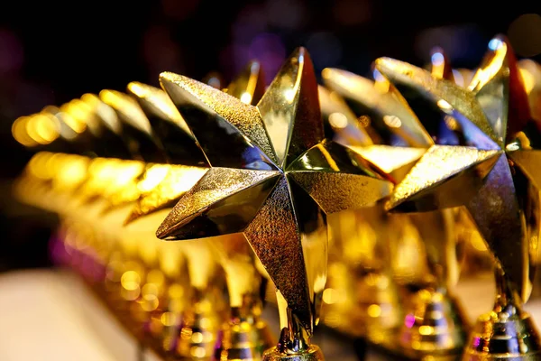 Złote trofea, nagrody w postaci gwiazdek — Zdjęcie stockowe