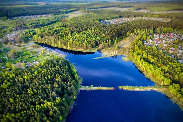 Torn dam among the shores of the lake, view from the drone. — Stock Photo, Image