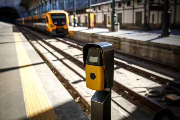 Deep yellow ticket validation machine on a railway, railroad station. — Stock Photo, Image