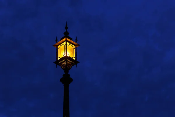 Shining old square lantern, twilight — Stock Photo, Image