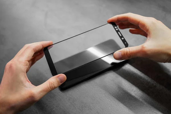 replacing broken glass with a new one. Broken smartphone display. Broken glass phone. Smartphone repair