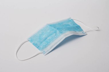 Koruyucu maske. Virüs ve bakterilerin maskesi. Tıbbi maske. tabletler