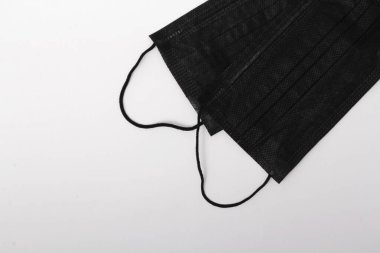 Koruyucu maske. Virüs ve bakterilerin maskesi. Tıbbi maske. tabletler