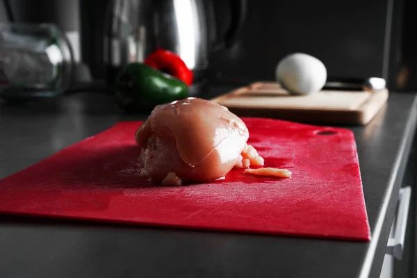 chicken fillet on a cutting board. recipe. Cook at home. fresh meat. a hen