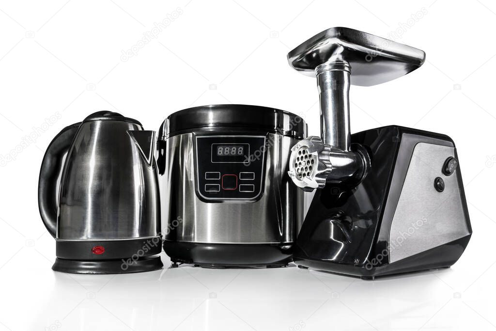 electric kettle, multicooker pressure cooker, electric meat grinder on a white background. small household appliances for the home. modern kitchen interior
