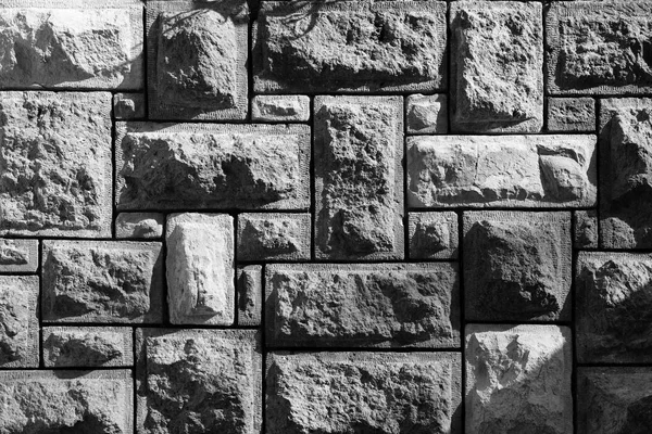 Fondo del patrón de superficie de pared de piedra desigual decorativa en blanco y negro —  Fotos de Stock
