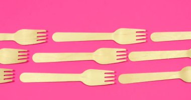 Stop motion Disposable appliance background for a meal of wood. Eco concept.
