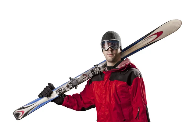 Лыжник с парой лыж — стоковое фото