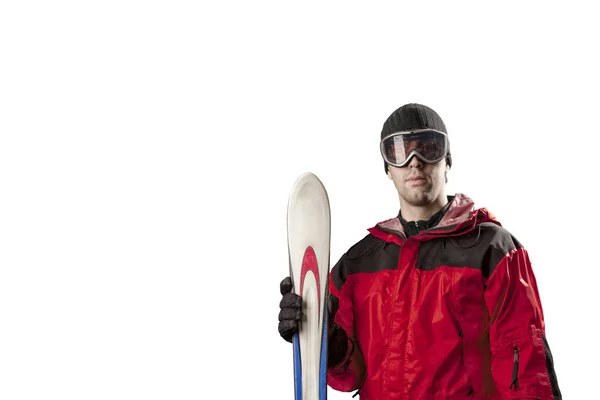 Skieur tenant une paire de skis — Photo