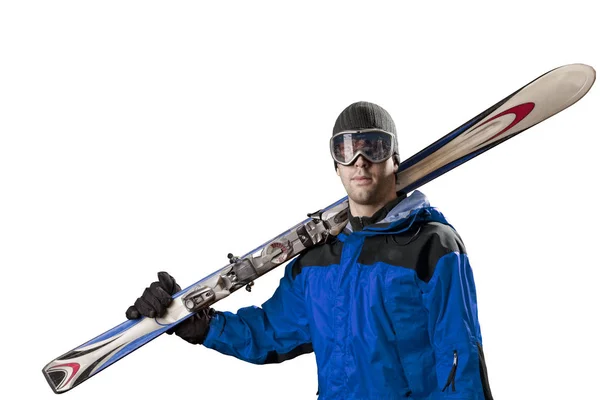 Skifahrer mit einem Paar Skier — Stockfoto