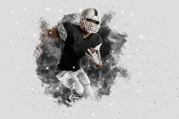 Football Player coming out of a blast of smoke — Stock Photo, Image