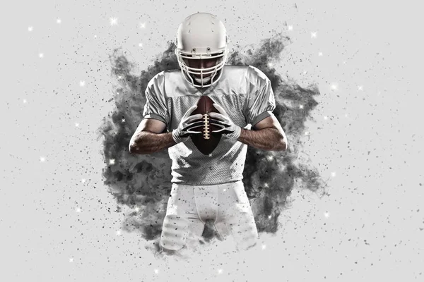 Football Player coming out of a blast of smoke — Stock Photo, Image