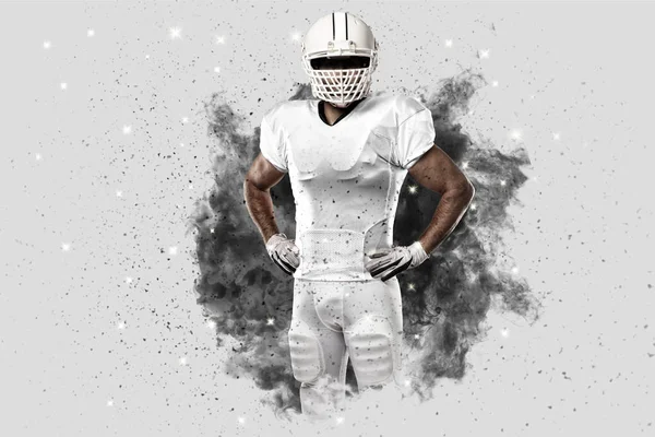 Football Player coming out of a blast of smoke — Stock Photo, Image