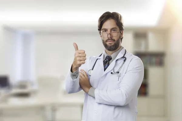 Male doctor in his office — Stock Photo, Image