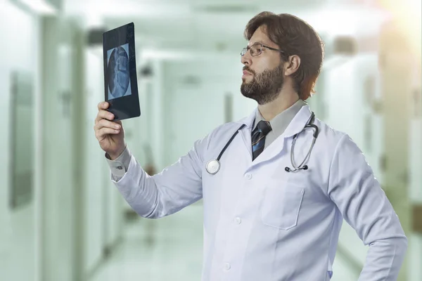 Male doctor in his office — Stock Photo, Image