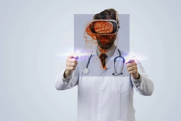 Male doctor in his office — Stock Photo, Image