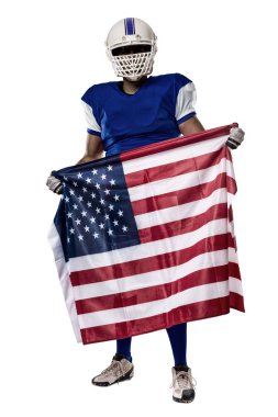 Futbolcu mavi bir üniforma ile