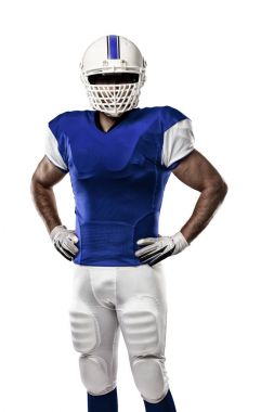 Futbolcu mavi bir üniforma ile