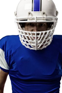 Futbolcu mavi bir üniforma ile