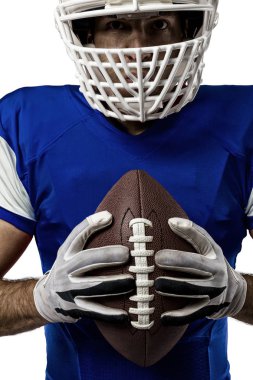 Futbolcu mavi bir üniforma ile