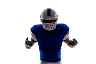 Futbolcu mavi bir üniforma ile