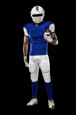 Futbolcu mavi bir üniforma ile