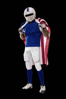 Futbolcu mavi bir üniforma ile