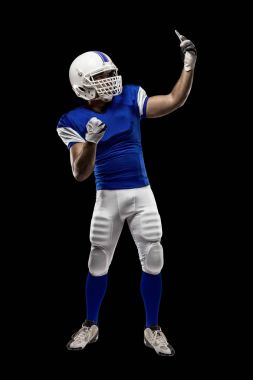 Futbolcu mavi bir üniforma ile