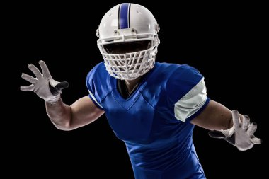 Futbolcu mavi bir üniforma ile