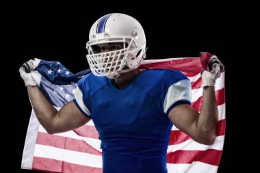 Futbolcu mavi bir üniforma ile