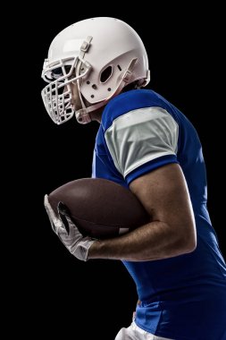 Futbolcu mavi bir üniforma ile