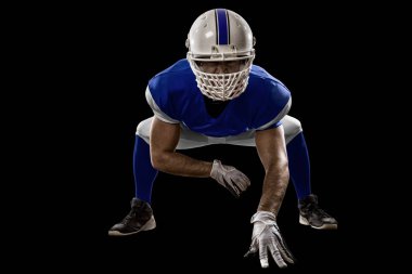 Futbolcu mavi bir üniforma ile