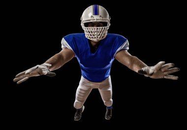 Futbolcu mavi bir üniforma ile