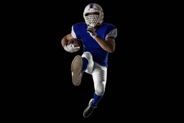 Futbolcu mavi bir üniforma ile