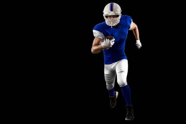 Futbolcu mavi bir üniforma ile