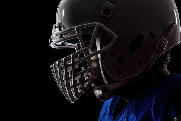 Jogador de futebol com um uniforme azul — Fotografia de Stock