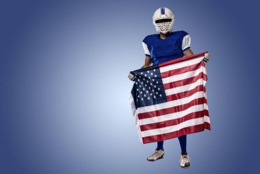 Futbolcu mavi bir üniforma ile