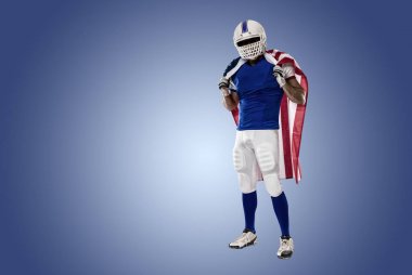 Futbolcu mavi bir üniforma ile