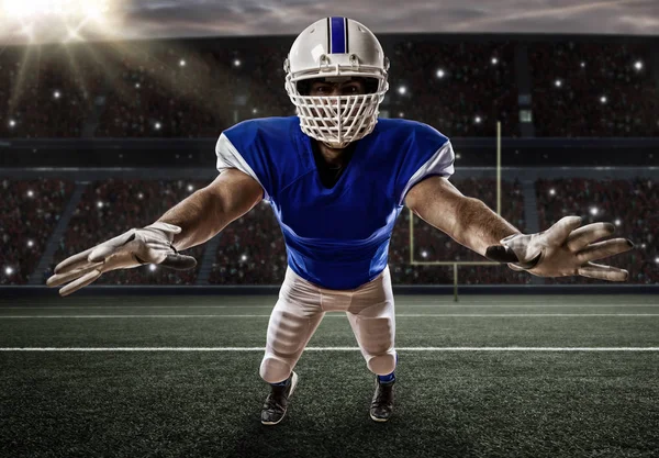 Voetballer met een blauwe uniform — Stockfoto