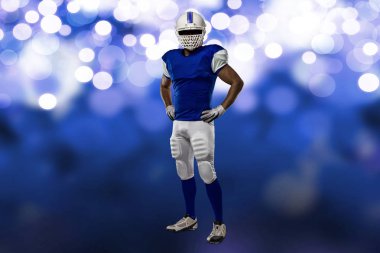 Futbolcu mavi bir üniforma ile