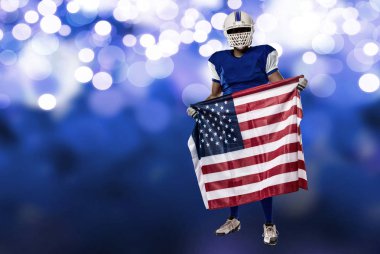 Futbolcu mavi bir üniforma ile