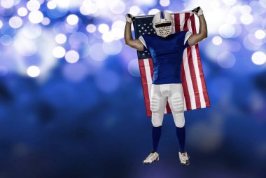 Futbolcu mavi bir üniforma ile