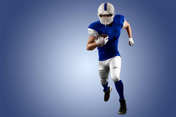 Football Player with a blue uniform — Stock Photo, Image