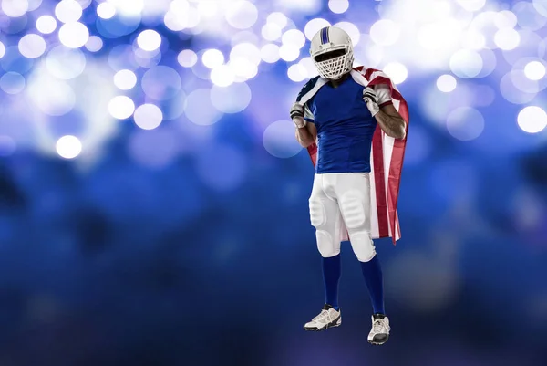 Futbolcu mavi bir üniforma ile — Stok fotoğraf