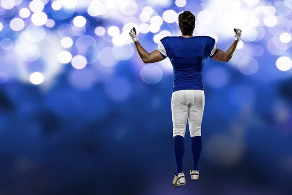 Voetballer met een blauwe uniform — Stockfoto