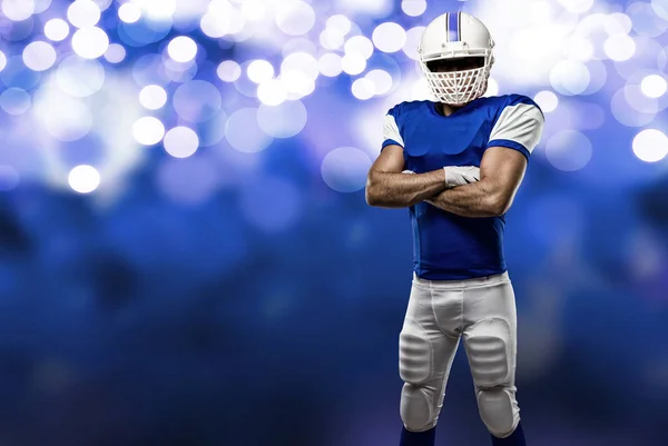 Jogador de futebol com um uniforme azul — Fotografia de Stock