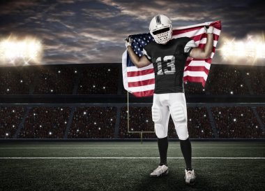 Futbolcu siyah üniforma ile